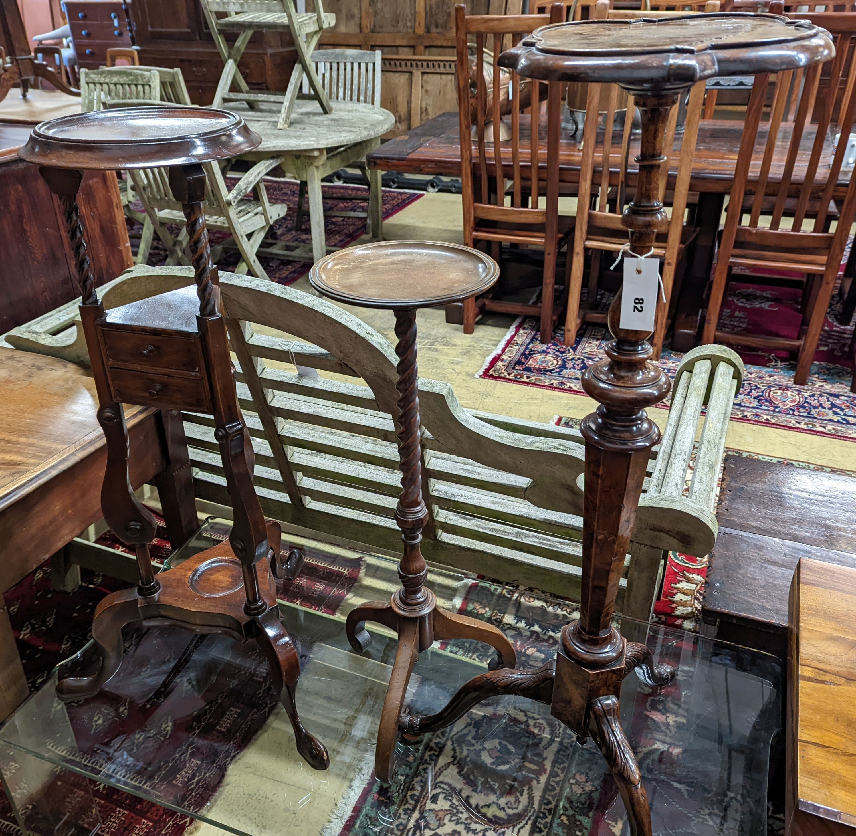 A George I style yew and walnut tripod candlestand, height 97cm, together with one other and a reproduction wash stand